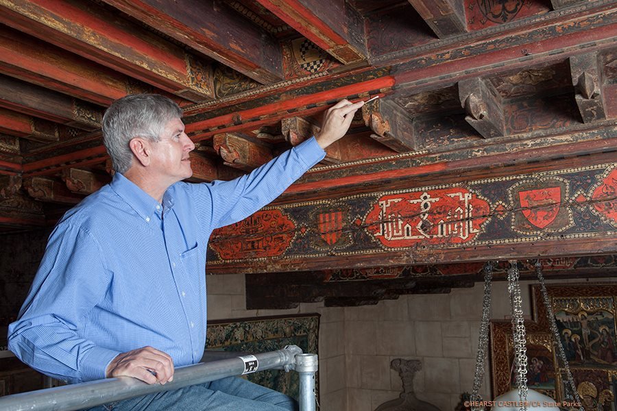 Conservator Gary Hulbert doing restoration work on the Morning Room
