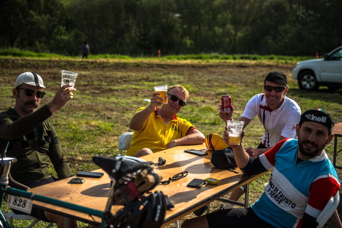 Eroica cyclists drinking beers